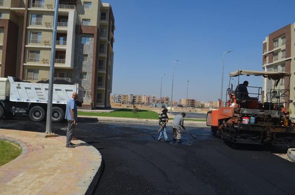 الإسكان": رصف الطرق لعمارات "دار مصر" غرب المال والأعمال والحي الـ32